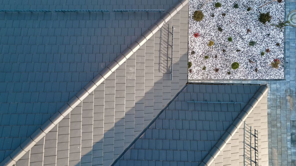 Drone Pilot Flies Drone Quadcopter Inspecting Construction Site, drone inspection, roof inspection, roofing solutions